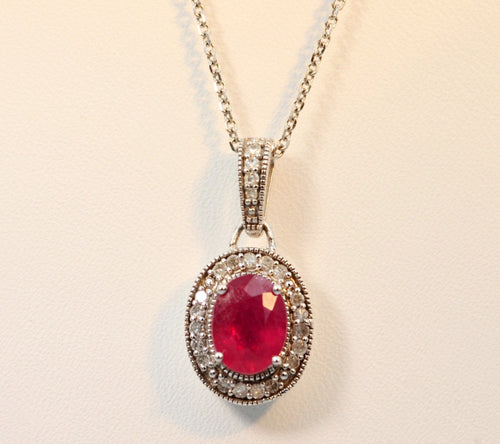 14K white gold pendant with oval Ruby framed with Diamonds with Diamond bail