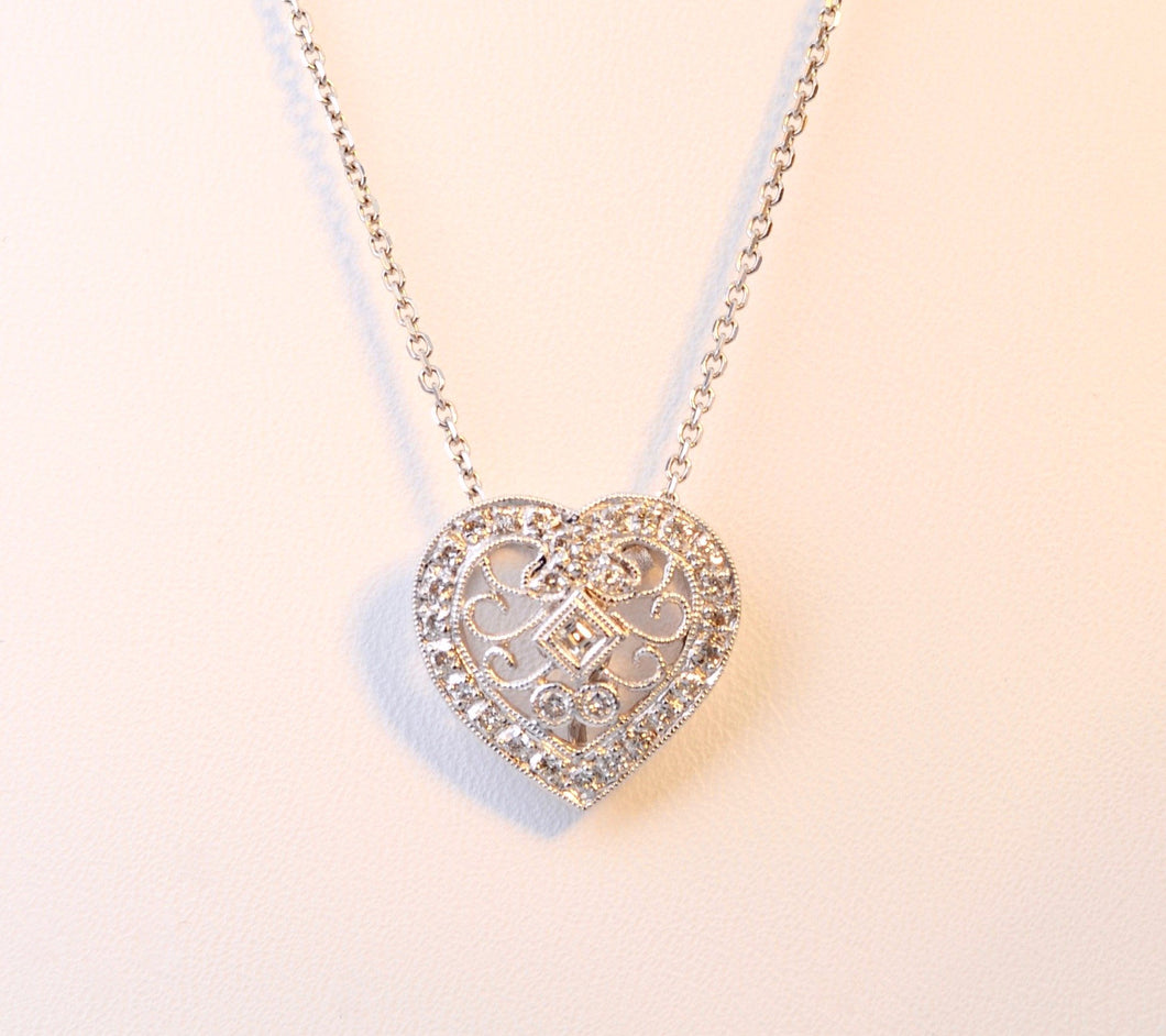 Heart-shaped diamond pendant in 18K White Gold