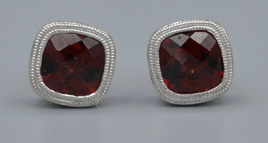 14K white gold post earrings with faceted garnets in square criss-cross cut