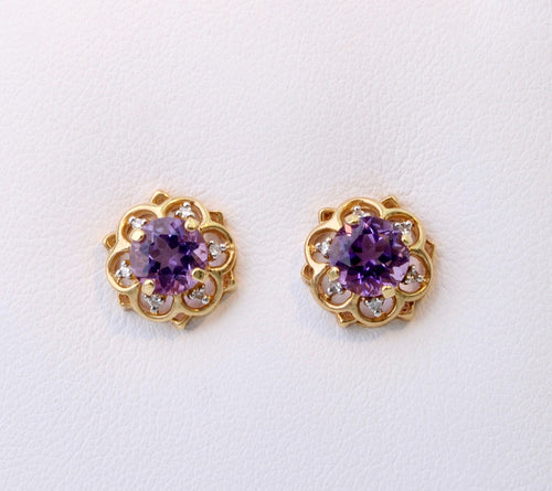 14K yellow gold post earrings with one center Amethyst and six Diamonds