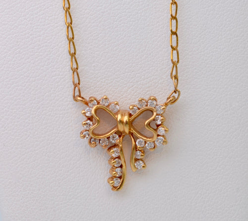 Diamond-studded Bow-Shaped Necklace in 14K Yellow Gold