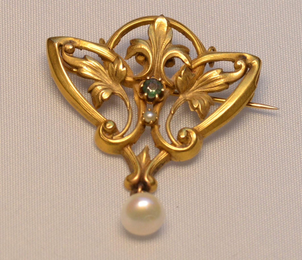 14K yellow gold Art Nouveau Brooch with one center Emerald and one pearl drop