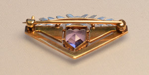 14K yellow gold brooch with white gold floral trim on top and Amethyst, with white enamel trims
