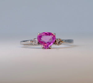 14K White Gold ring with one center Pink Sapphire and 2 side Diamonds