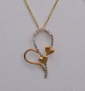 10K yellow gold heart-shaped pendant with Diamonds