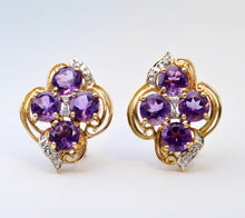 14K yellow gold earrings with four round Amethysts in each earring and diamond trims