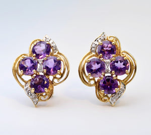 14K yellow gold earrings with four round Amethysts in each earring and diamond trims