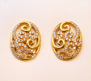 18K yellow gold scroll earrings with Diamonds